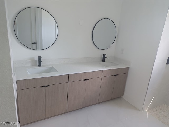 bathroom featuring tile patterned floors and vanity