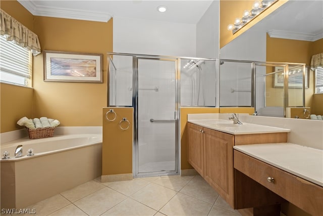 bathroom featuring plus walk in shower, tile patterned flooring, ornamental molding, and vanity