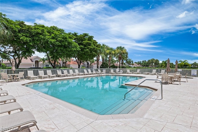 view of swimming pool featuring a patio