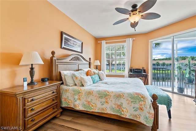 bedroom with access to exterior, ceiling fan, and light wood-type flooring