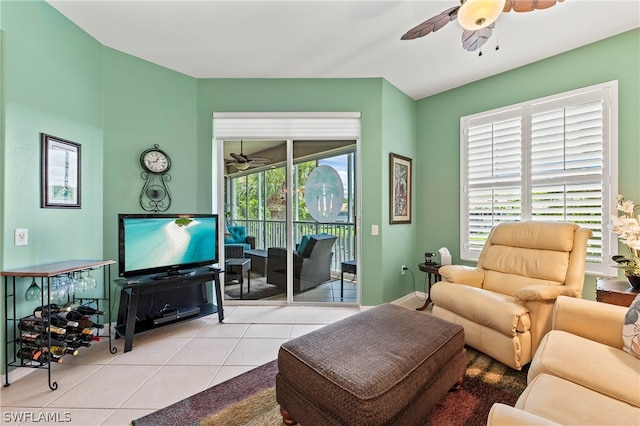 tiled living room featuring ceiling fan