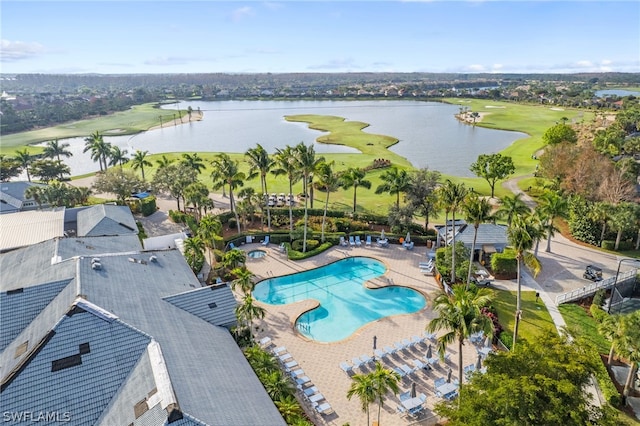 view of pool featuring a water view and a patio area