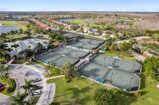 birds eye view of property featuring a water view