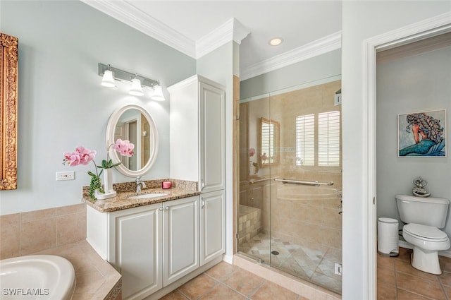 full bathroom with ornamental molding, vanity, separate shower and tub, tile patterned flooring, and toilet