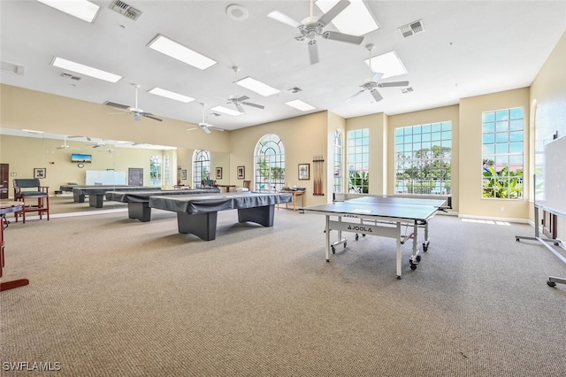 rec room with light colored carpet, a wealth of natural light, and pool table