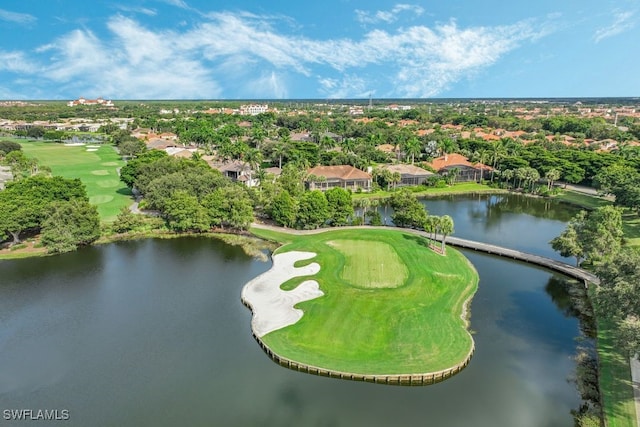 bird's eye view with view of golf course and a water view