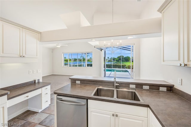 kitchen with dishwasher, sink, ceiling fan with notable chandelier, and a healthy amount of sunlight