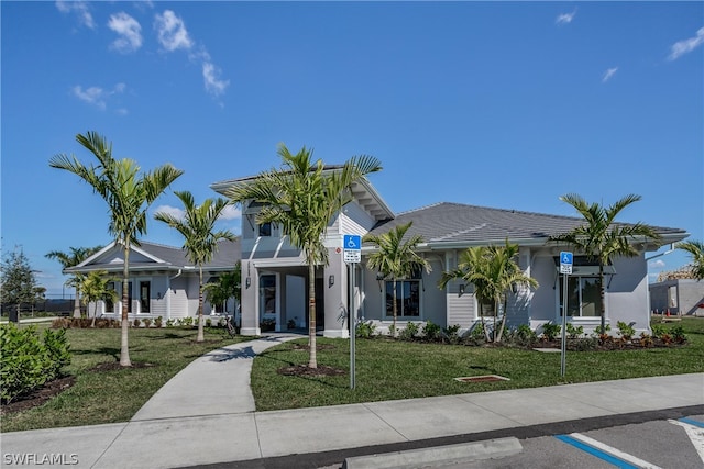 view of front facade with a front yard