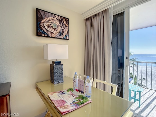 dining area featuring a water view