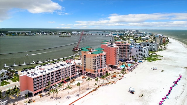 aerial view featuring a view of the beach and a water view