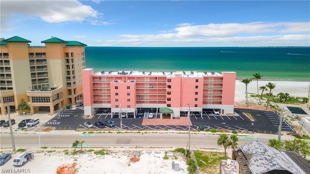 bird's eye view with a beach view and a water view