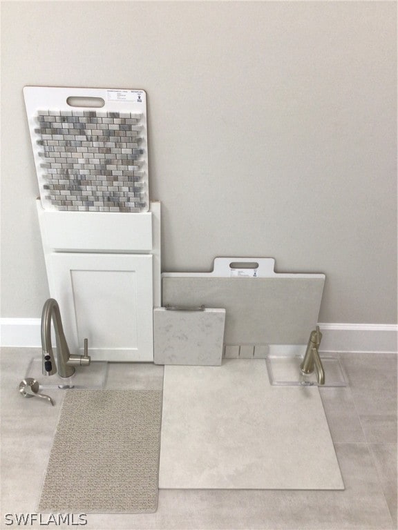 bathroom with tile patterned flooring