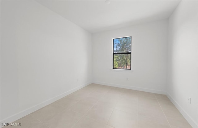 17161 Oakstead Dr, Alva, FL 33920 - empty room with baseboards and light tile patterned floors