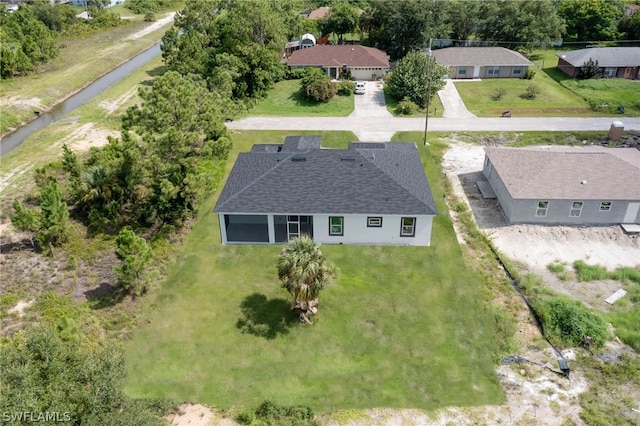 3211 12th St W, Lehigh Acres, FL 33971 - drone / aerial view featuring a residential view
