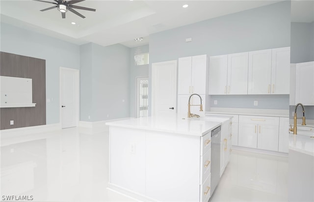 3211 12th St W, Lehigh Acres, FL 33971 - kitchen featuring white cabinets, light countertops, recessed lighting, and ceiling fan