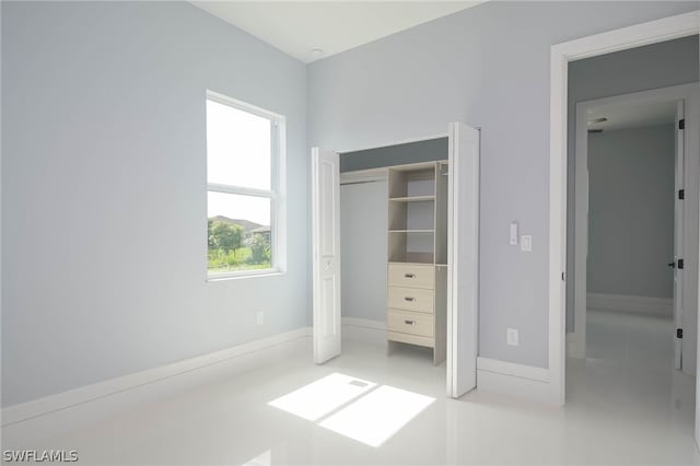 unfurnished bedroom featuring a closet