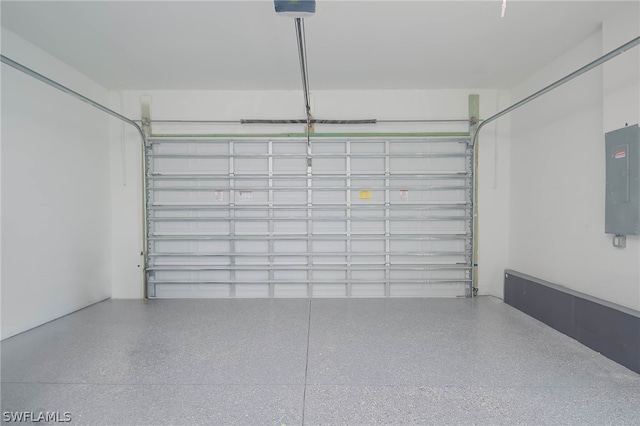 3211 12th St W, Lehigh Acres, FL 33971 - garage with electric panel and a garage door opener