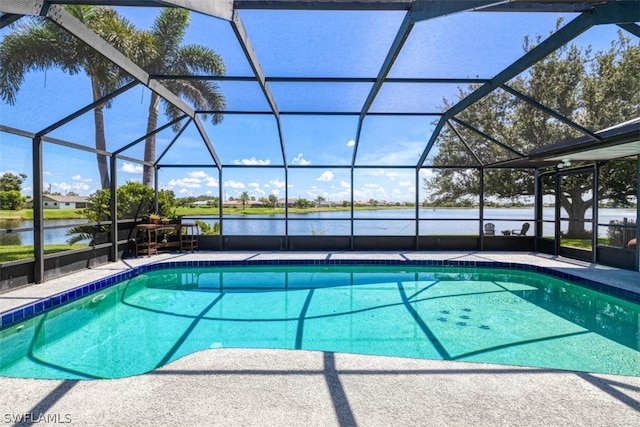 view of swimming pool featuring a lanai