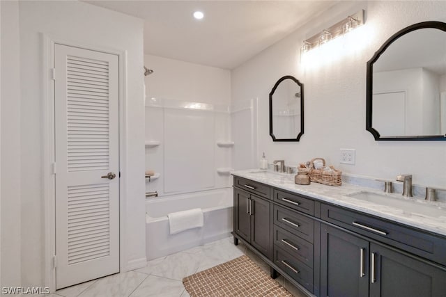 bathroom with double vanity, tile patterned flooring, and shower / bathtub combination