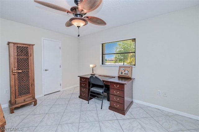 home office with ceiling fan and light tile patterned floors