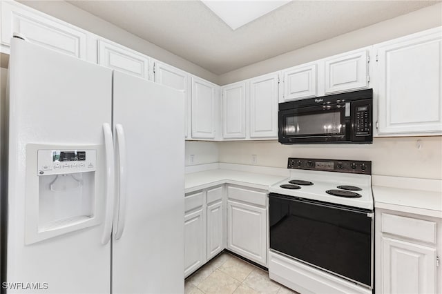 900 Arbor Lake Dr Unit 9-501, Naples, FL 34110 - kitchen with white refrigerator with ice dispenser, electric range oven, black microwave, and white cabinets