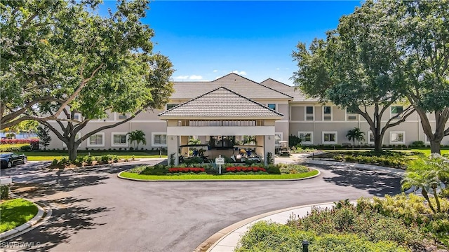 900 Arbor Lake Dr Unit 9-501, Naples, FL 34110 - view of property with curved driveway