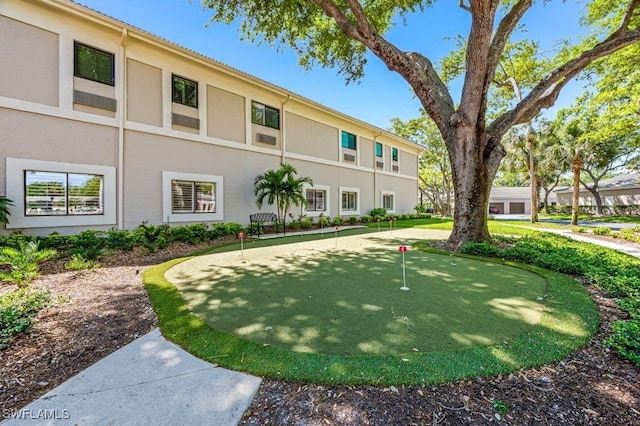 900 Arbor Lake Dr Unit 9-501, Naples, FL 34110 - view of home's community featuring a putting green