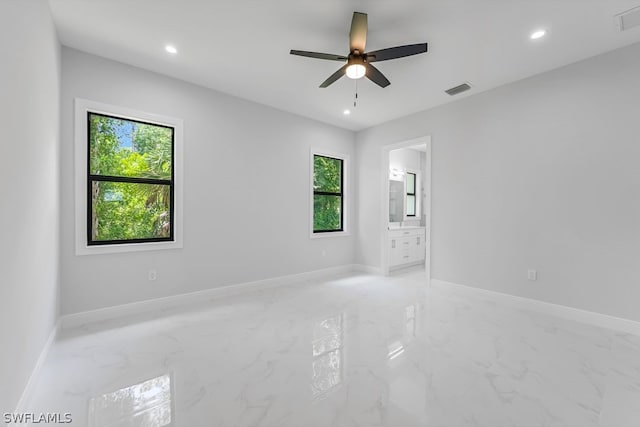 spare room featuring ceiling fan