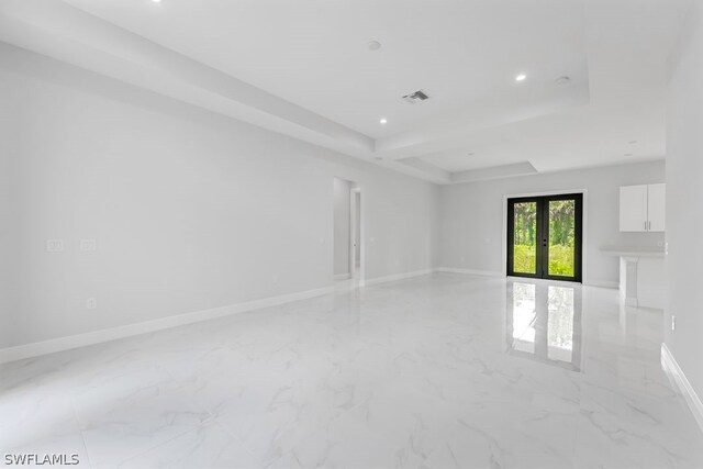 spare room with french doors