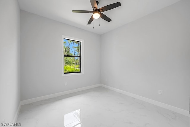 unfurnished room with ceiling fan