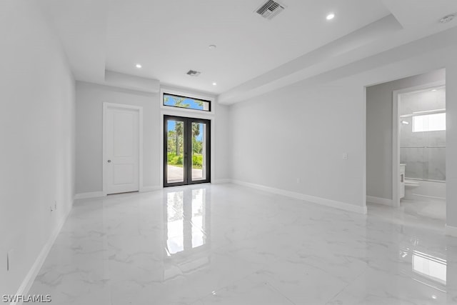 spare room with french doors