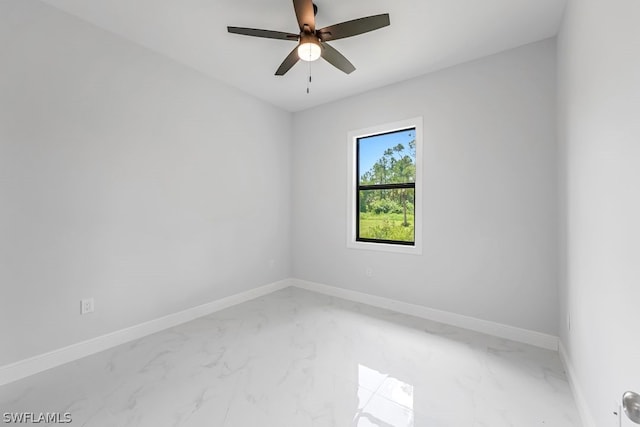 unfurnished room with ceiling fan