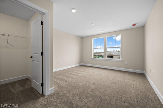 view of carpeted spare room