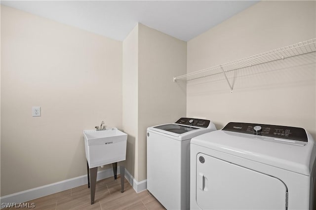 laundry room featuring washer and dryer