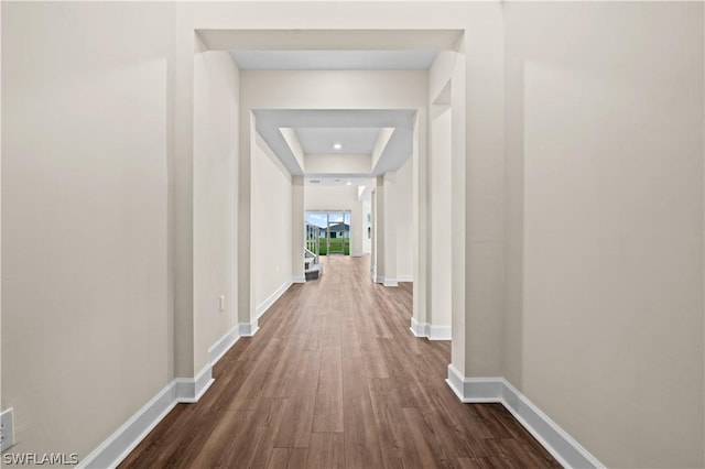 hallway featuring dark hardwood / wood-style floors