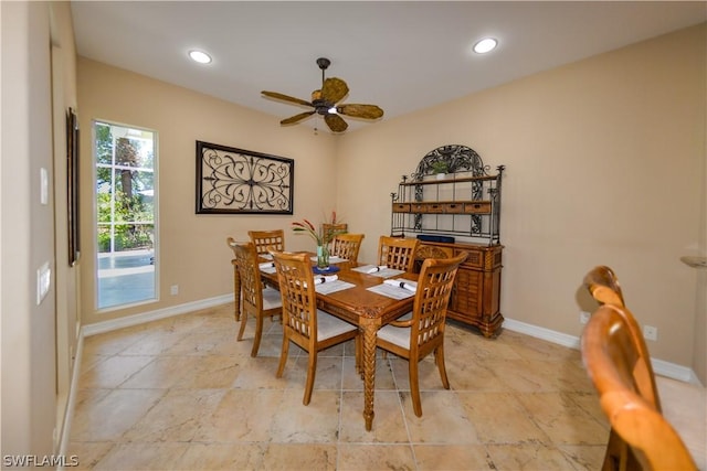 dining space featuring ceiling fan