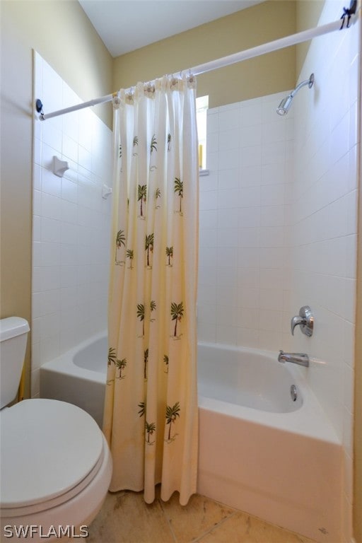 bathroom with tile patterned floors, toilet, and shower / bath combination with curtain