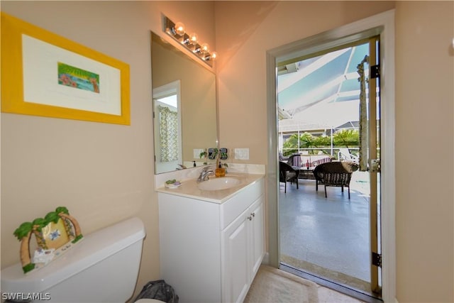 bathroom with vanity and toilet