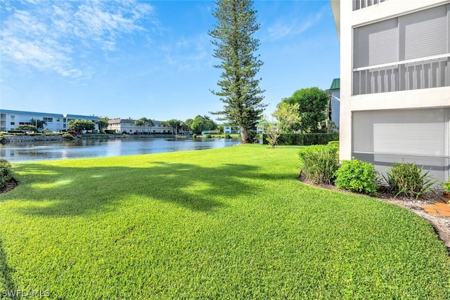 view of yard with a water view