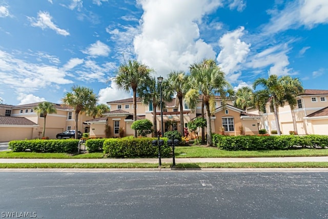 view of front of home with a front lawn