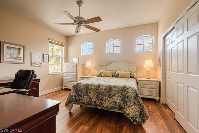 bedroom featuring hardwood / wood-style flooring and ceiling fan