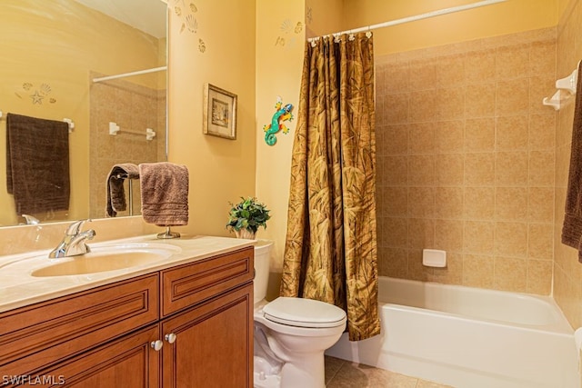 full bathroom with tile patterned floors, vanity, toilet, and shower / tub combo with curtain