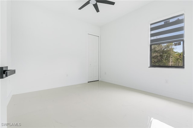 unfurnished room featuring ceiling fan