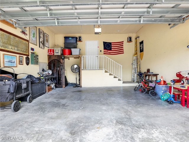 garage featuring a garage door opener