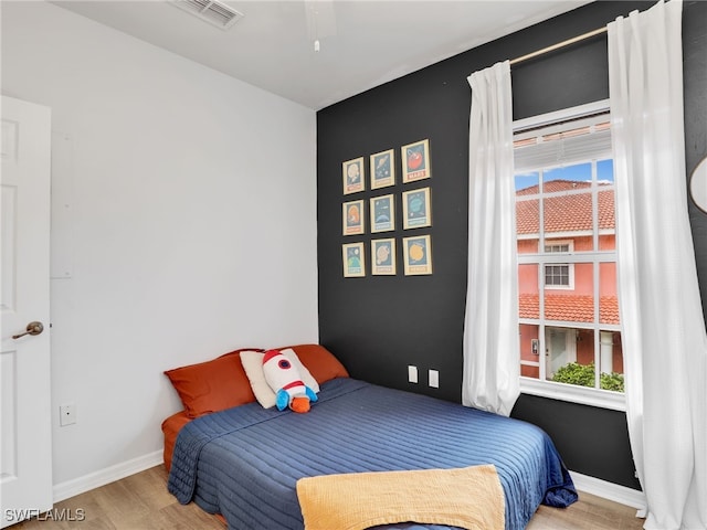 bedroom featuring light hardwood / wood-style floors