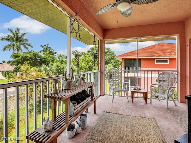 balcony featuring ceiling fan