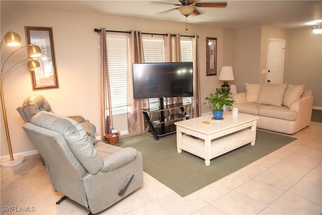 tiled living room featuring ceiling fan