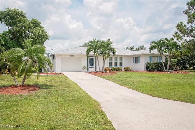 single story home with a front yard and a garage