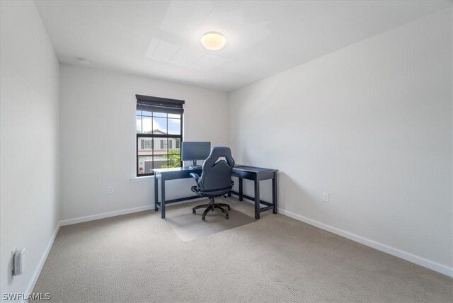 office space with carpet floors and baseboards