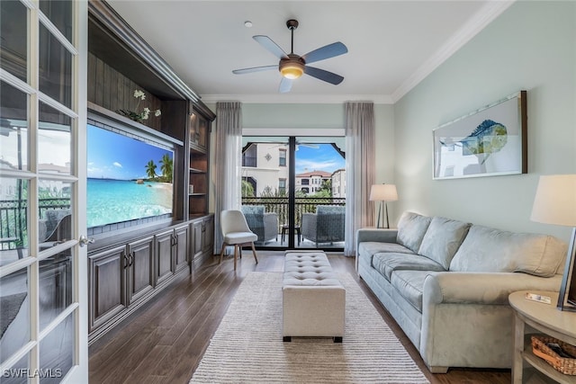 living room with ornamental molding, ceiling fan, and hardwood / wood-style floors